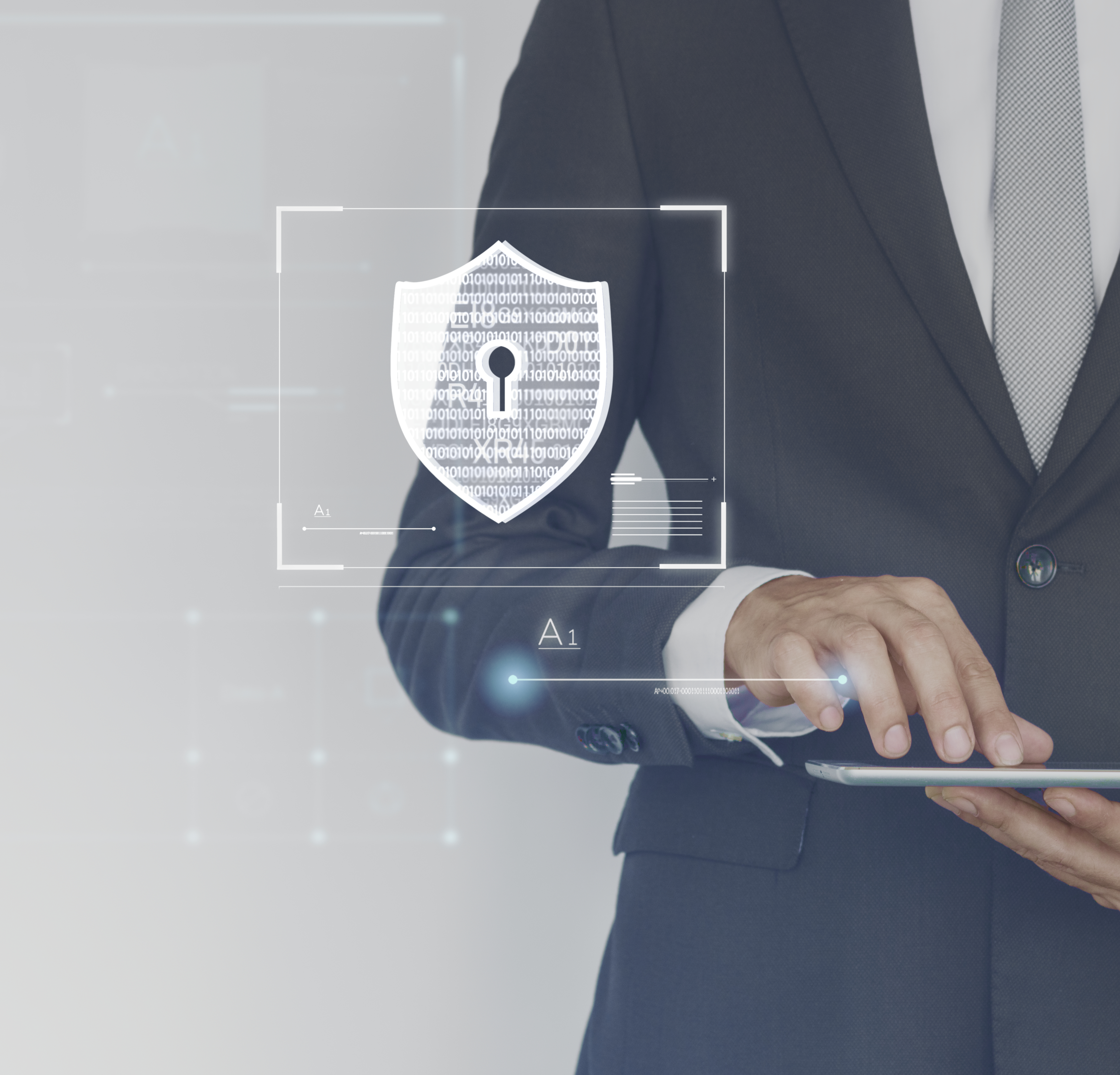 Businessman logging his tablet